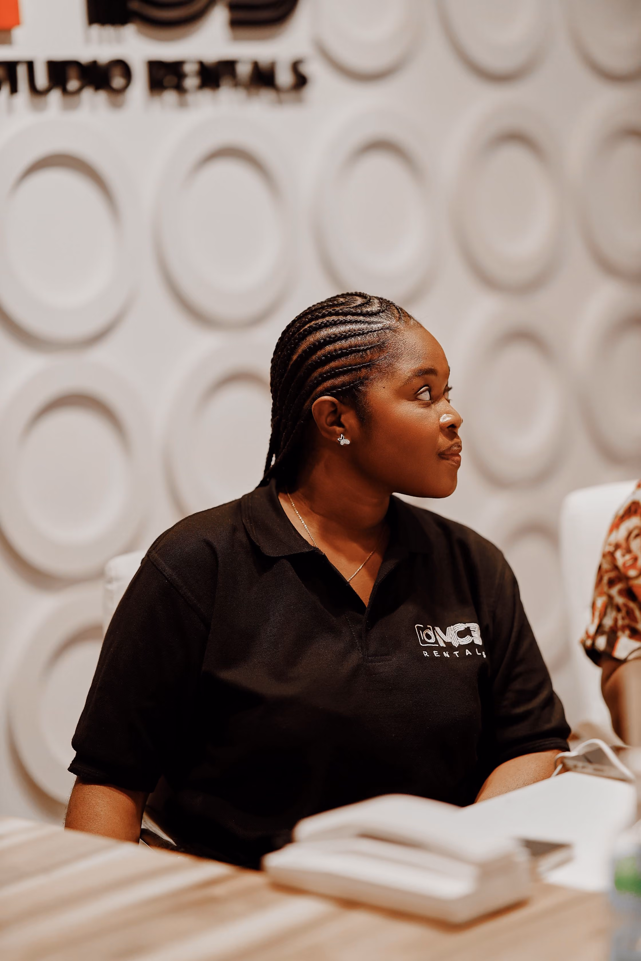 Hospitality worker in a Miami hotel lobby
